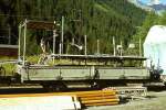RhB - Xk 8616 II am 23.08.1995 in Preda - Niederbord-Dienstwagen 2-achsig mit 1 offenen Plattform, Tunnelrstwagen - Baujahr 1896 - SIG - Gewicht 4,80t - Zuladung 10,00t - LP 7,45m - zulssige