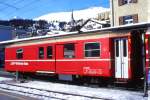 RhB - D 4224 - Gepckwagen am 26.02.2000 in St.Moritz - bernahme 29.02.1980 - SWS/SWP - Fahrzeuggewicht 14,00t - Zuladung 8,00t - LP 13,74m - zulssige Geschwindigkeit 90 km/h.- 2=31.05.1991