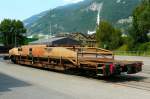 RhB - Sl 7757 am 13.07.2013 in Untervaz - Tragwagen fr ACTS-Container 4-achsig mit 1 offenen Plattform - bernahme 23.02.2001 - JMR - Gewicht 15,91t - Zuladung 44,00t - LP 16,04m - zulssige