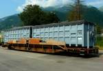 RhB - Sl 7766 am 13.07.2013 in Untervaz - Tragwagen fr ACTS-Container 4-achsig mit 1 offenen Plattform - Baujahr 2001 bernahme 14.06.2001 - JMR - Gewicht 15,89t - Zuladung 44,00t - LP 16,04m -