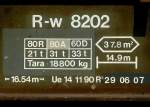 RhB - R-w 8202 II am 13.03.2013 in Untervaz - Flachwagen mit Rungen 4-achsig mit 1 offenen Plattform - bernahme 14.11.1990 - FC - Anschriftenfeld  