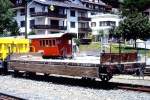 RhB - K-w 7501 am 30.05.1992 in Klosters - Niederbordwagen 2-achsig mit 1 offenen Plattform - Baujahr 1914 - SWS/RhB - Gewicht 6,97t - Zuladung 15,00t - LP 8,97m - zulssige Geschwindigkeit Aufkleber