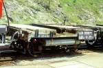 RhB - Lck 7819 am 28.06.1995 in Filisur - Schutzwagen (ehemals Langholztransportwagen) 2-achsig mit 1 offenen Plattform - Baujahr 1906 - Staud - Fahrzeuggewicht 5,00t (mit Betongewicht) - Zuladung