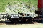 RhB - Lck 7820 am 28.06.1995 in Filisur - Schutzwagen (ehemals Langholztransportwagen) 2-achsig mit 1 offenen Plattform - Baujahr 1906 - Staud - Fahrzeuggewicht 5,12t (mit Betongewicht) - Zuladung