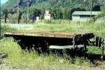 RhB - Lck 7824 am 29.08.1995 in Castione Arbedo - Schutzwagen (ehemals Langholztransportwagen) 2-achsig - Baujahr 1908 - Ringh - Fahrzeuggewicht 3,20t - Zuladung 10,00t - LP 3,70m -zulssige