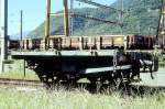 RhB - Lck 7826 am 24.08.1997 in Castione Arbedo - Schutzwagen (ehemals Langholztransportwagen) 2-achsig - Baujahr 1913 - SWS - Fahrzeuggewicht 3,25t - Zuladung 10,00t - LP 3,70m -zulssige