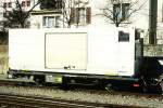 RhB - Lb-v 7852 am 28.02.1997 in Chur - Container-Transportwagen 2-achsig mit 1 offenen Plattform beladen mit Khl-Container - Baujahr 1911 - SIG - Gewicht 5,26 - Zuladung 17,00t - LP 8,54m -