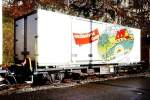 RhB - Lb-v 7857 am 23.10.1998 in St.Moritz - Container-Tragwagen 2-achsig mit COOP-Container - Baujahr 1983 bernahme 16.07.1997 - JMR - Gewicht 5,72t - LP 9,14 - Zuladung 17,00t - zulssige