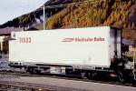 RhB - Lb-v 7858 am 22.10.1998 in Zernez - Container-Tragwagen mit RhB-Khlcontainer Y11532 2-achsig - Baujahr 1983 bernahme 12.11.1997 - JMR - Gewicht 5,70t - LP 9,14 - Zuladung 14,00/17,00t -