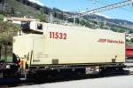 RhB - Lb-v 7858 am 07.10.1999 in Scuol - Container-Tragwagen mit RhB-Khlcontainer Y11532 2-achsig - Baujahr 1983 bernahme 12.11.1997 - JMR - Gewicht 5,70t - LP 9,14 - Zuladung 14,00/17,00t -