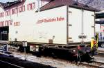 RhB - Lb-v 7858 am 11.03.2000 in Pontresina - Container-Tragwagen mit RhB-Khlcontainer Y11532 2-achsig - Baujahr 1983 bernahme 12.11.1997 - JMR - Gewicht 5,70t - LP 9,14 - Zuladung 14,00/17,00t -