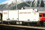 RhB - Lb-v 7859 am 08.10.1999 in Samedan - Container-Tragwagen mit RhB-Container Y11531 2-achsig mit 1 offenen Plattform - Baujahr 1983 bernahme 12.12.1997 - JMR - Gewicht 5,86t - LP 9,14 - Zuladung 14,00/17,00t - zulssige Geschwindigkeit 14t/80 17t/60 km/h - 3=12.12.1997 - Lebenslauf: ex Gb 5074 - 07/1997 ausr - 12.12.1997 Lb-v 7859 - 11.07.2006 Lb 7859
