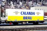 RhB - Lb-v 7860 am 17.03.2000 in Zernez - Container-Tragwagen mit Calanda-Bru-Container 2-achsig - Baujahr 1983 bernahme 16.10.1998 - JMR - Gewicht 5,80t - LP 9,14 - Zuladung 14,00/17,00t -