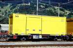 RhB - Lb-v 7865 am 20.06.1999 in Landquart - Container-Tragwagen 2-achsig mit Post-Container - Baujahr 1963 - JMR - Gewicht 5,63t - Ladegewicht 14,00/17,00t -  zulssige Geschwindigkeit 14t/80 17t/60