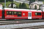 Personenwagen/329260/rhb---bi-35605-zweisystem-triebzug-- RhB - Bi 356.05 Zweisystem-Triebzug - Zwischenwagen am 25.07.2010 in St.Moritz - Logo Graubnden in rtoromanisch
