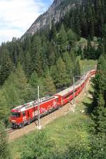 RhB Regio-Express 1140 von St.Moritz nach Chur am 21.08.2008 unterhalb Zuondra-Tunnel mit E-Lok Ge 4/4 III 642 - B 2264 - A 1228 - A 1282 - A 1283 - B 2392 - B 2432 - B 2367 - D 4215  