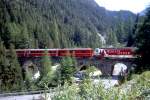 RhB - Regio-Express 1137 von Chur nach St.Moritz am 21.08.2008 auf Albula-Viadukt I mit E-Lok Ge 4/4 III 650 - D 4221 - B 2444 - B 2380 - B 2494 - A 1269 - A 1229 - B 22268 - WR 3813- 3x Lb - Haikv  