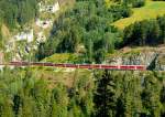 RhB - Bernina-Express 951 von Chur nach Tirano am 15.07.2013 zwischen Schmittentobel-Viadukt und Landwasserviadukt mit Zweisystem-Triebwagen ABe 8/12 3502 (ABe 4/4 35.002 - Bi 35.602 - ABe 4/4 35.102)