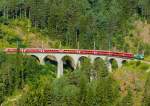 RhB - Regio-Express 1125 von Chur nach St.Moritz am 15.07.2013 auf Schmittentobel-Viadukt mit Ge 4/4 III 647 - D - B - B - B - A - A - B - B  