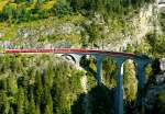 RhB - Regio-Express 1125 von Chur nach St.Moritz am 15.07.2013 auf Landwasser-Viadukt mit Ge 4/4 III 647 - D - B - B - B - A - A - B - B  