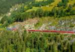 RhB - Regio-Express 1128 von St.Moritz nach Chur am 15.07.2013 beim Zalaint-Tunnel mit E-Lok Ge 4/4 III 652 - B - B - A - A -A - B - B - B - D  