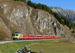 albulabahn-chur-stmoritz/328800/rhb---regioexpress-1121-von-chur RhB - Regioexpress 1121 von Chur nach St.Moritz am 29.09.2009 zwischen Samedan und Celerina mit Ge 4/4 II 611 - D - B - B - B - A - A
