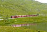 RhB - Regionalzug 1640 von Tirano nach St.Moritz am 14.07.2013 am Lago Pitschen mit Zweisystem-Triebwagen ABe 8/12 3515 (ABe 4/4 351.15 - Bi 356.15 - ABe 4/4 350.15) - BD 2478 - AB 1544 - B 541.06 - B