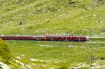 RhB - Regionalzug 1625 von St.Moritz nach Tirano am 14.07.2013 auf Alp Arlas in 70-Promille-Steigung oberhalb Oberer Berninabachrcke mit Zweisystem-Triebwagen ABe 8/12 3502 (ABe 4/4 35.002 - Bi
