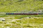 RhB - Bernina-Express 976 von Tirano nach St.Moritz am 14.07.2013 bei Alp Arlas mit Triebwagen ABe 4/4 III 55 - ABe 4/4 III 56 - Bp 2523 - Bp 2521 - Bps 2515 - Api 1306 - Ap 1291  