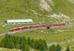 RhB - Regionalzug 1629 von St.Moritz nach Tirano am 14.07.2013 bei Alp Bondo mit Zweisystem-Triebwagen ABe 8/12 3514 (ABe 4/4 35.014 - Bi 35.614 - ABe 4/4 35.114) - B 521.07 - B 2455 - B 2454 - AB