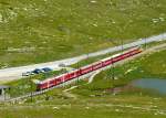 RhB - Regionalzug 1648 von Tirano nach St.Moritz am 14.07.2013 am Lago Pitschen mit Zweisystem-Triebwagen ABe 8/12 3505 (ABe 4/4 351.05 - Bi 356.05 - ABe 4/4 350.05) - BD 2474 - AB 1546 - B 2312 - B