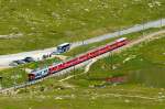 RhB - Regionalzug 1652 von Tirano nach St.Moritz am 14.07.2013 am Lago Pitschen mit Triebwagen ABe 4/4 III 53 - ABe 4/4 III 54 - BD 2472 - AB 1545 - B 2313 - B 2452 - B 2311 - B 541.01  