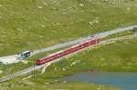 RhB - Regionalzug 1637 von St.Moritz nach Tirano am 14.07.2013 bei Lago Pitschen mit Zweisystem-Triebwagen ABe 8/12 3504 (ABe 4/4 351.04 - Bi 356.04 - ABe 4/4 350.04) - B 541.03 - B 2458 - B 541.05 -