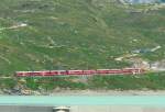 RhB - Regionalzug 1656 von Tirano nach St.Moritz am 14.07.2013 am Lago Bianco mit Zweisystem-Triebwagen ABe 8/12 3501 (ABe 4/4 351.01 - Bi 356.01 - ABe 4/4 350.01) - BD 2475 - AB 1542 - B 541.08 - B