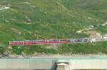 RhB - Bernina-Express 975 von St.Moritz nach Tirano am 14.07.2013 am Lago Bianco mit ABe 4/4 III 56 - ABe 4/4 III 55 - Ap 1291 - Api 1306 - Bps 2515 - Bp 2521 - Bp 2623  