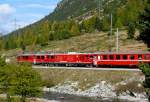 RhB - Regionalzug 1638 von Tirano nach St.Moritz am 01.10.2009 zwischen Bernina Suot und Morteratsch mit ABe 4/4 III 54 + Gem 4/4 801 - Bd - AB - B - B - B - B  
