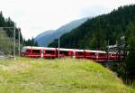 RhB - Regionalzug 1642 von Tirano nach St.Moritz am 15.07.2010 Einfahrt St.Moritz mit Zweisystem-Triebwagen ABe 8/12 3505 (ABe 4/4 351.05 - Bi 356.05 - ABe 4/4 350.05) - BD 2473 - AB 1545 - B 2258 - B