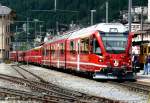 RhB - Regionalzug 1649 von St.Moritz nach Tirano am 15.07.2010 in St.Moritz mit Zweisystem-Triebwagen ABe 8/12 3505 (ABe 4/4 351.05 - Bi 356.05 - ABe 4/4 350.05) - A 531.01 - B 2451 - B 2452 - B 2458