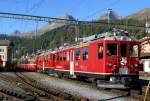 RhB - Bernina-Express 971 von St.Morit nach Tirano am 04.10.2009 in St.Moritz mit Triebwagen ABe 4/4 II 45 + ABe 4/4 III 54 - Ap 1291 - Api 1303 - Bps 2415 - Bp 2503 - Bp 2505 - Bp 2506  