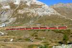RhB - Bernina-Express 972 von Tirano nach St.Moritz am 04.10.2009 oberhalb Lagalb mit Triebwagen ABe 4/4 III 54 - ABe 4/4 II 45 - Bp - Bp - Bp - Bp - Ap - Ap  