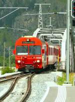 RhB - Regionalzug 1941 von Scuol nach Pontresina am 19.07.2013 Einfahrt Zernez mit Steuerwagen vorraus BDt 1753 - B - WS - B - A - E-Lok Ge 4/4 II 611
