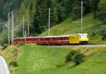 RhB Regio-Express 1129 von Chur nach St.Moritz am 20.07.2014 Einfahrt Bergn mit E-Lok Ge 4/4 III 644 - B 2301 - B 2302 - B 2306 - Ds 4213 - B 2362 - B 2357 - B 2365 - A 1235 - A 1249
